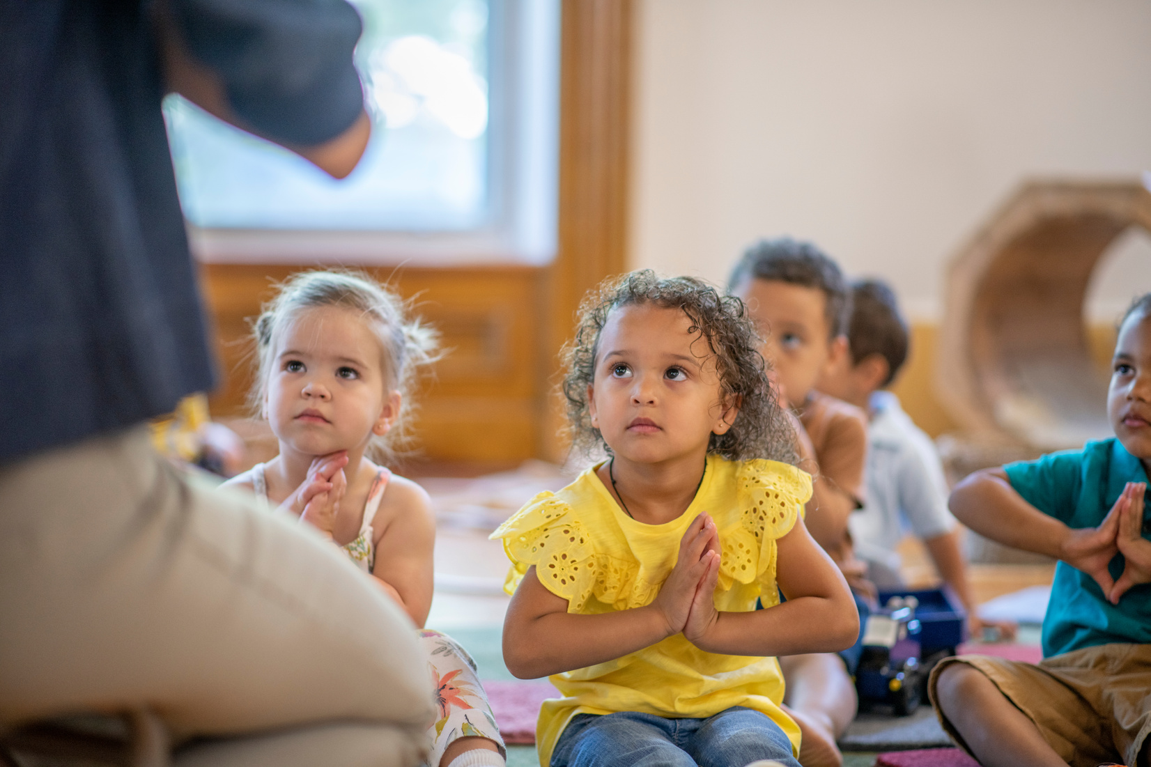 Preschool kids doing yoga